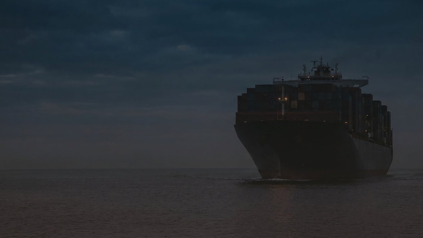 Container ship at sea during twilight - Nordic Horizon maritime operations